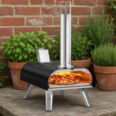 Big Horn 12 inch pizza oven in black with its chimney on a stone ledge, pizza baking inside
