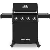 Broil King Crown 410 Shadow in black, lid closed, both side shelves raised and four knobs across the front
