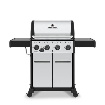 Broil King Crown S 440 with a stainless lid and cabinet doors, black shelves out, four knobs and a side burner knob