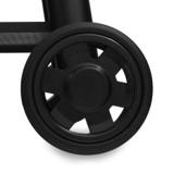 Close-up of one crack-proof wheel on the Regal 400 Charcoal Offset, edge of the steel bottom shelf above