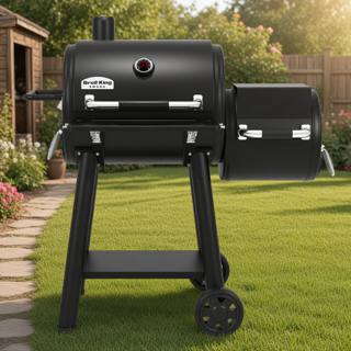 Broil King Regal 400 Charcoal Offset, black steel barrel cooker with a smaller offset chamber at right and two wheels.