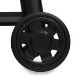 One of the two 8-inch crack-proof wheels on the Regal Pellet 400, photographed close against white