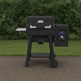 Broil King Regal Pellet 400 pellet grill, black barrel lid with stainless handle, side hopper and lit digital controller