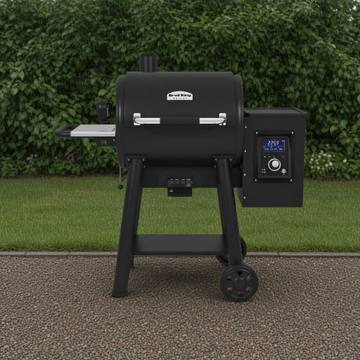 Broil King Regal Pellet 400 pellet grill, black barrel lid with stainless handle, side hopper and lit digital controller