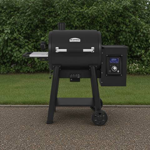 Broil King Regal Pellet 400 pellet grill, black barrel lid with stainless handle, side hopper and lit digital controller