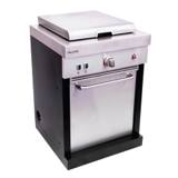 Char-Broil Medallion griddle module from three quarters, showing the black side panel and gas inlet port