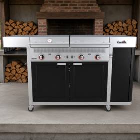 Char-Broil Vista outdoor kitchen head-on, two closed stainless lids, four red-collared knobs, black doors, on casters