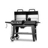 Char-Griller FlexFuel Plus with both lids raised on white, showing the swing-away wire racks inside each barrel