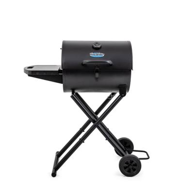 King-Griller Gambler E1816 charcoal grill in black, lid shut, side shelf out, standing on its folding cart