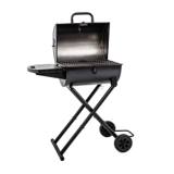 King-Griller Gambler with the lid swung open, showing the cooking grate inside the black barrel