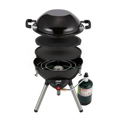 Coleman 4-in-1 cooking system exploded on white: wok, grill plate, griddle, burner base, tripod legs and propane cylinder