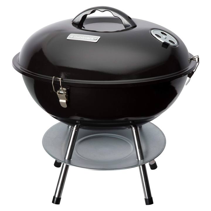 Cuisinart CCG-190 portable charcoal grill in black, lid latched shut, standing on three steel legs above its grey ash dish