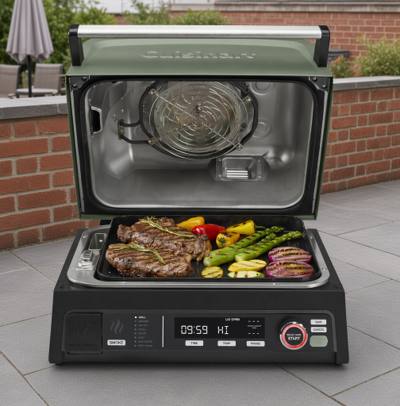 Cuisinart FlavorBoost CEG-1302 with its green lid open, steak and vegetables on the grill plate, panel lit