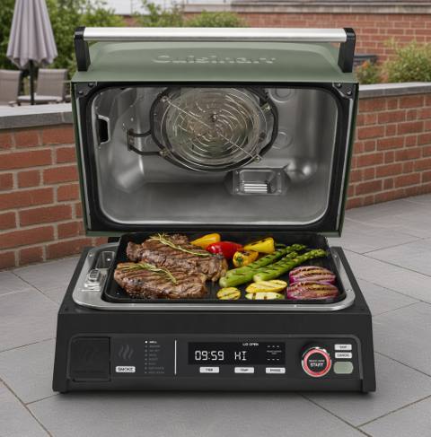 Cuisinart FlavorBoost CEG-1302 with its green lid open, steak and vegetables on the grill plate, panel lit