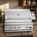 DCS 36-inch Series 9 built-in stainless gas grill, hood closed, rotisserie motor housing on the right