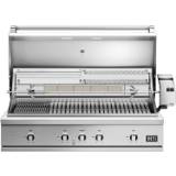 DCS 48-inch Series 9 grill hood open: sear grate at left, rotisserie spit and forks, two racks and a tray above