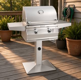 Fire Magic CM430s stainless grill on a post with a square base plate, bolted to a gray timber deck, timer dial on the post