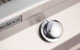 Close-up of a Fire Magic control knob on the CM650i panel, OFF marking above it and the brand badge alongside