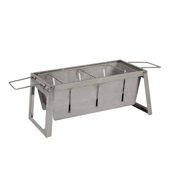 Fire Sense foldaway stainless charcoal grill standing open on its legs, wire grate on top, wire handles hooked at each end