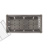Top-down view into the Fire Sense trough with the grate lifted aside, showing the perforated coal plate and wall slots