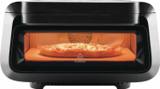 Frigidaire indoor pizza oven from the front, a pizza on the stone behind the glowing window