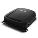 George Foreman GRP1060B contact grill closed on white, black lid with red and green lights, drip tray at the front