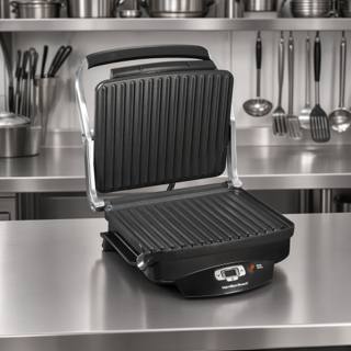 Hamilton Beach 25331 open on a stainless prep bench, both ribbed plates and the lit control strip in view