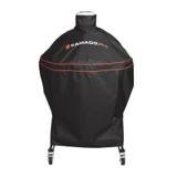 Black Kamado Joe Big Joe cover with two red piping bands and a loop handle on top, over a cart grill with casters below