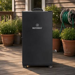 Masterbuilt 30 inch digital electric smoker on a wooden deck beside potted plants and a garden hose reel