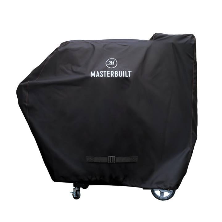 Black Masterbuilt cover on a Gravity grill, taller over the hopper end, with a buckled strap low on the front