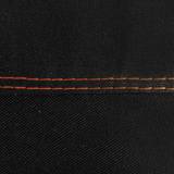 Close up of the black woven cover fabric with a double row of orange stitching along a seam
