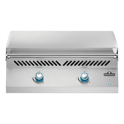 Napoleon Built-in 700 Series 32 griddle head, stainless lid down, two blue lit control knobs on the front panel