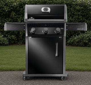 Napoleon Rogue 425 propane grill in black with three knobs, a closed lid and both side shelves raised