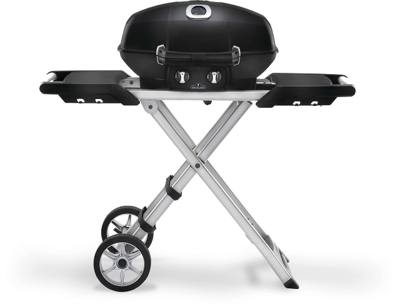 Napoleon TravelQ PRO285X in black on its folding scissor cart, lid closed, both side shelves out