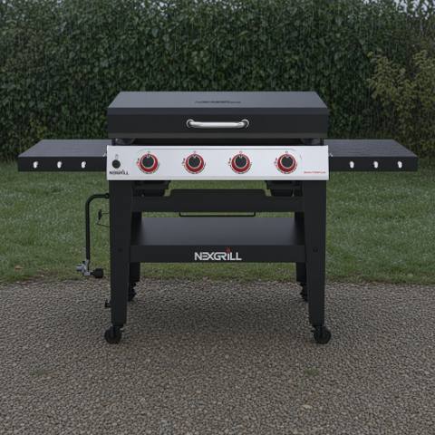 Nexgrill Daytona 4-burner griddle on wet gravel, lid closed, four red knobs on a stainless panel between black shelves