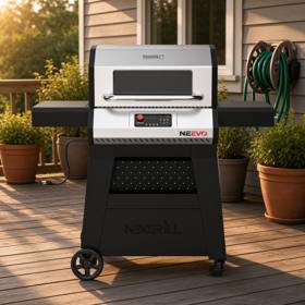 Nexgrill Neevo 720 on a wooden deck at golden hour, lid closed, power cord and plug trailing across the boards