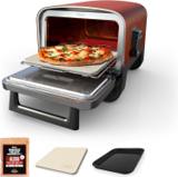 Ninja Woodfire OO100 pizza oven, door open, pizza on the stone, with the pellet bag, stone and pan in front
