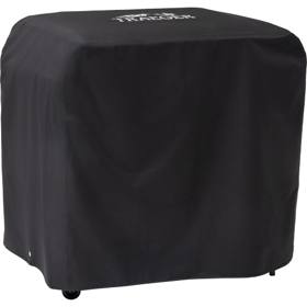 Black Traeger BAC889 cover drawn over a Flatrock 3 Zone griddle, white Traeger logo on the lid, casters showing below