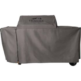 Gray Traeger full-length cover on a large Woodridge pellet grill, mountain logo on the hood, wheels under the hem