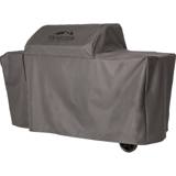 Angled view of the gray Traeger Woodridge Pro cover, the zipped seam at the left end standing slightly open
