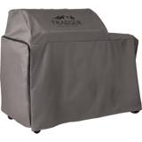 Three-quarter view of the gray Traeger Woodridge Pro cover, dark zipper trim running up the end panel