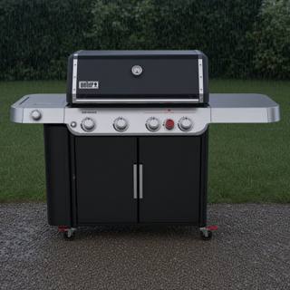 Black Weber Genesis E-435 gas grill on wet gravel, lid closed, red Sear Zone knob on the panel