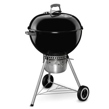 Black Weber Original Kettle Premium 22 with lid closed, lid thermometer, enclosed ash catcher, wire shelf and two wheels