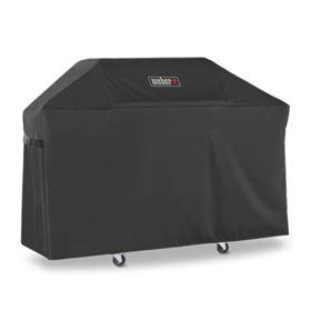Black Weber Premium Grill Cover over a three-burner Genesis cart, side strap visible, casters showing below the hem