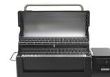 Lid open on the Weber Searwood XL 600, showing two stacked levels of bar-style cooking grates